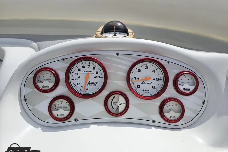 Slide: The Image of Dashboard of a 1999 Baja 272 boat with Livorsi gauges and compass. - 60