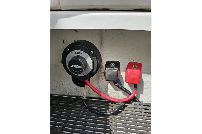 Slide: The Image of Battery switch and cables in a 1999 Baja 272 boat. - 88