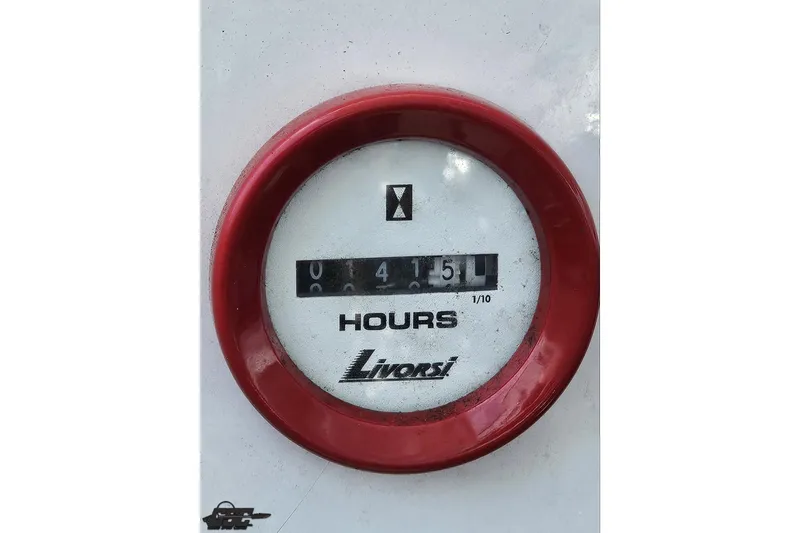 Slide: The Image of Hour meter reading 415.1 hours on 1999 Baja 272 boat. - 99