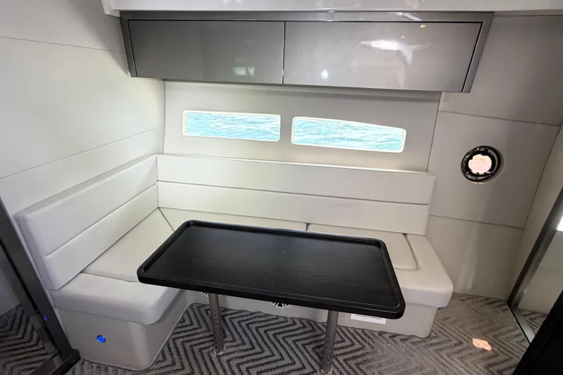 Slide: The Image of Modern interior of 2024 Schaefer 400 yacht with sleek seating and table. - 12