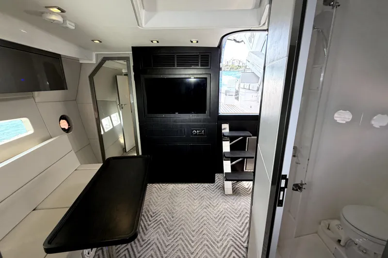 Slide: The Image of Luxurious interior of 2024 Schaefer 400 yacht with modern amenities and sleek design. - 9