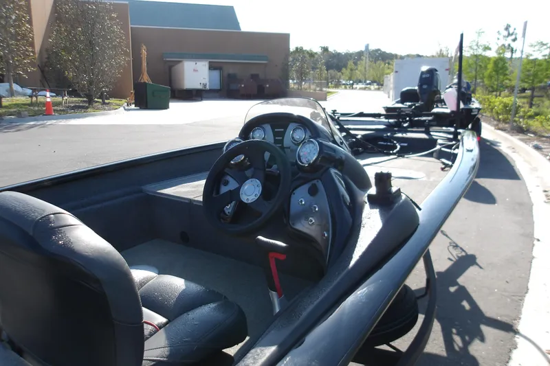 Slide: The Image of 2023 Tracker Pro Team 175 TXW boat interior with steering wheel and gauges. - 7
