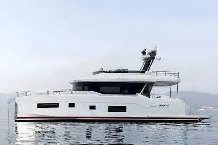 Slide: The Image of 2025 Sirena 58 yacht on calm water, showcasing sleek design and modern features. - 3