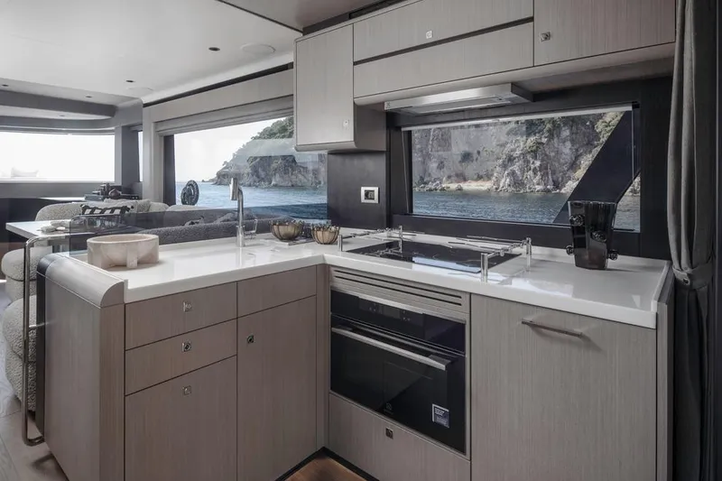 Slide: The Image of Modern kitchen interior on 2025 Sirena 58 yacht with ocean view. - 5
