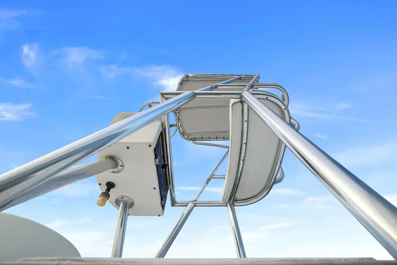 Slide: The Image of View of Contender 31 Open 2002 boat tower against blue sky. - 20