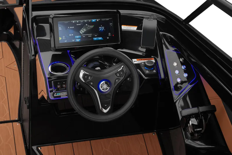 Slide: The Image of 2026 Yamaha Boats 255XD dashboard with advanced touchscreen and sleek steering wheel design. - 12