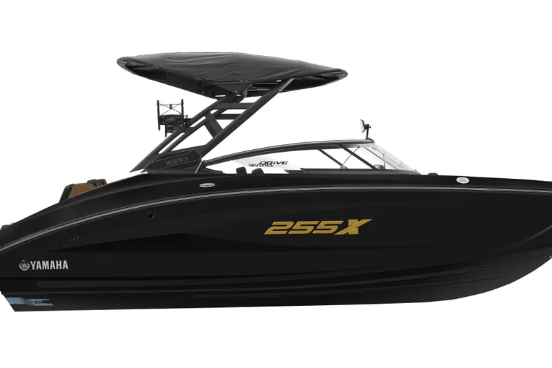 Slide: The Image of 2026 Yamaha Boats 255XD, sleek black design, side view with canopy and branding. - 15