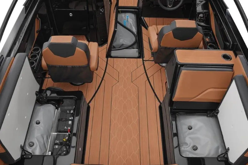 Slide: The Image of 2026 Yamaha Boats 255XD interior with tan seats and wood-style flooring. - 2