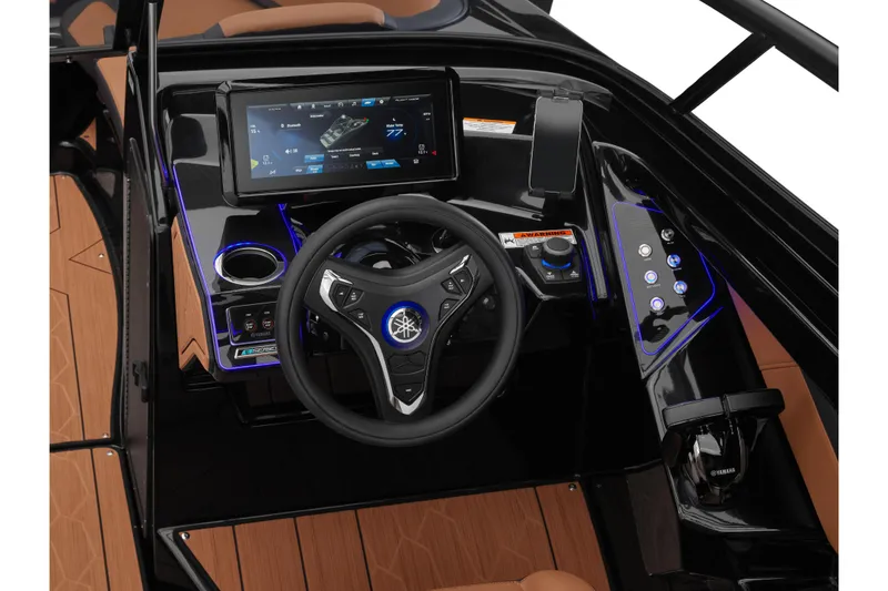 Slide: The Image of 2026 Yamaha Boats 255XD dashboard with touchscreen, steering wheel, and control panel. - 8