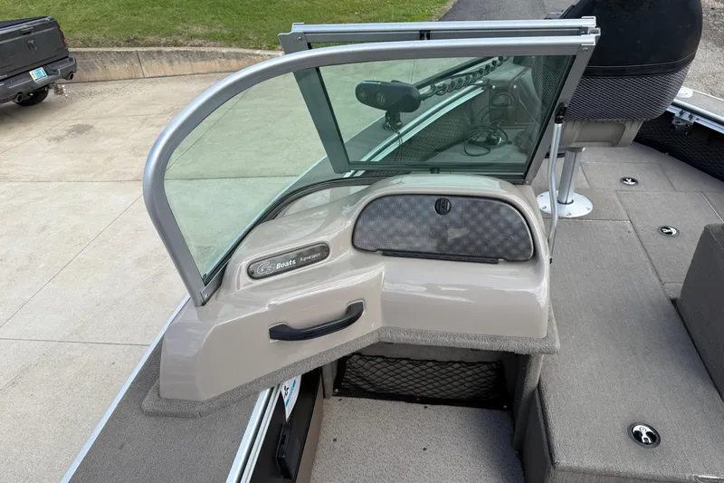 Slide: The Image of 2013 G3 Angler V185 SF boat interior with open windshield and seating area. - 20