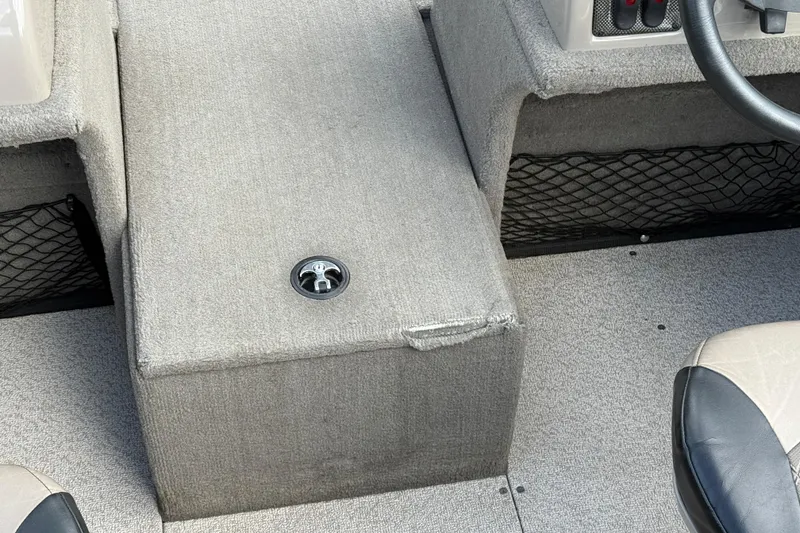 Slide: The Image of Interior of 2013 G3 Angler V185 SF boat with gray carpet and seating. - 21