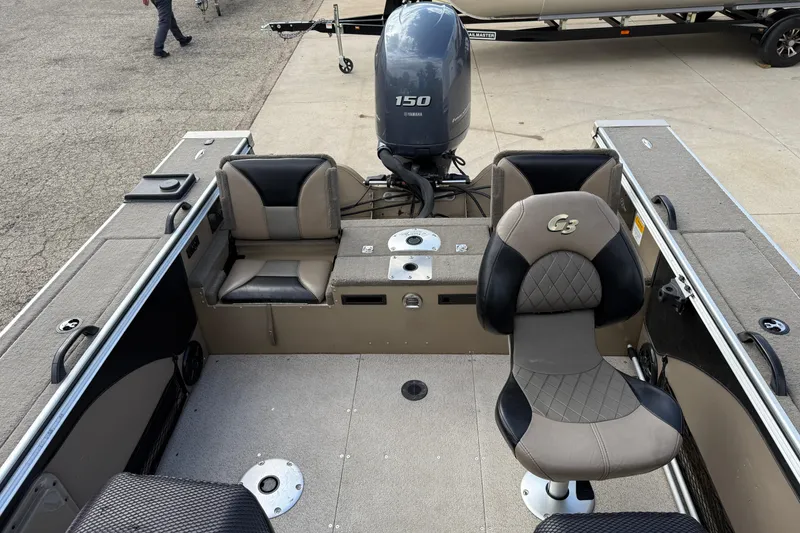 Slide: The Image of 2013 G3 Angler V185 SF boat interior with Yamaha 150 engine and seating. - 24