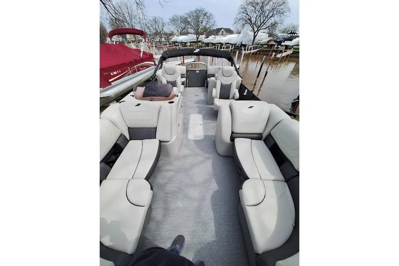 Slide: The Image of 2022 Starcraft SLS 1 DL pontoon boat with spacious seating and modern design. - 8