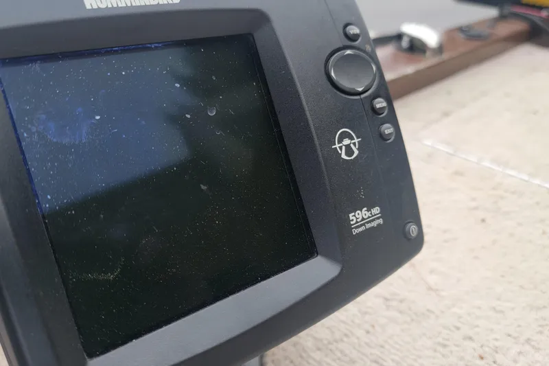 Slide: The Image of Close-up of a Humminbird 596c HD fish finder on a Nova NV JWMV1650SF, 2001 model. - 5
