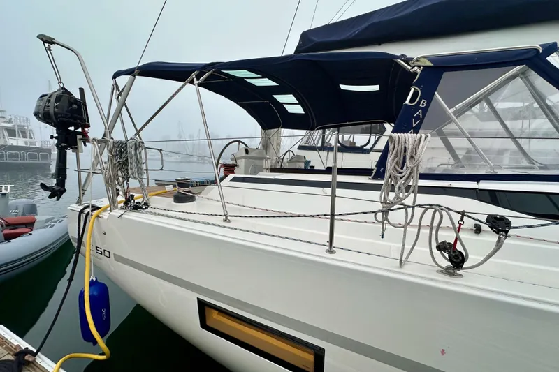 Slide: The Image of 2020 Bavaria C50 yacht docked, featuring sleek design and modern equipment. - 14