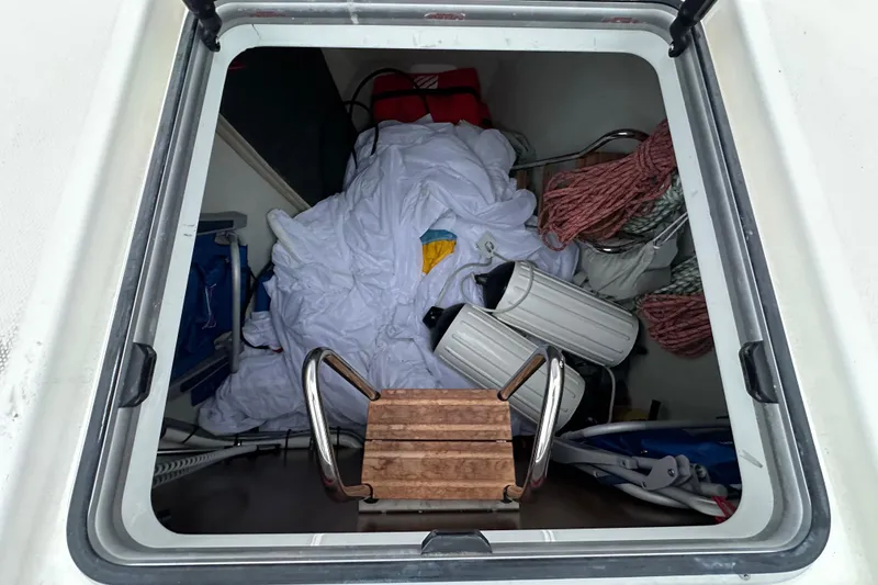 Slide: The Image of Storage compartment of a 2020 Bavaria C50 yacht with ropes and equipment. - 20