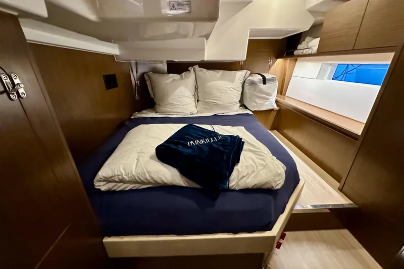 Slide: The Image of Luxurious cabin interior of 2020 Bavaria C50 yacht with cozy bedding and modern design. - 51