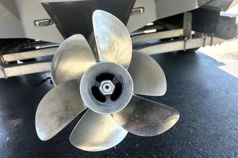 Slide: The Image of Close-up of a 2021 Regal 26 FasDeck boat propeller on a trailer. - 16