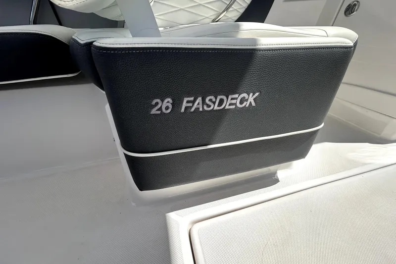 Slide: The Image of 2021 Regal 26 FasDeck boat seat with embroidered model name. - 35