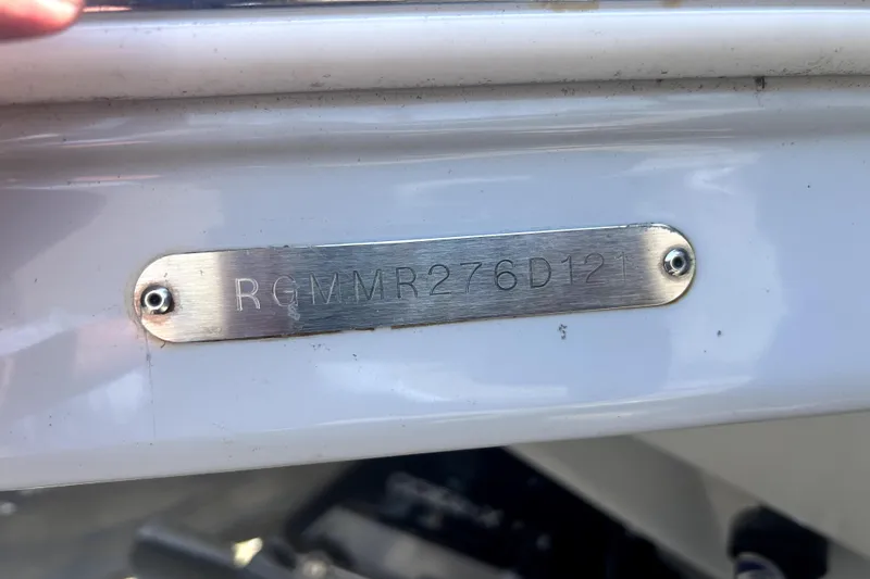 Slide: The Image of 2021 Regal 26 FasDeck boat hull identification number plate. - 46
