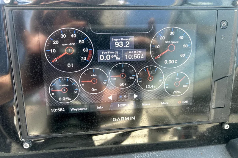 Slide: The Image of Garmin display on 2021 Regal 26 FasDeck showing engine metrics and GPS speed. - 6