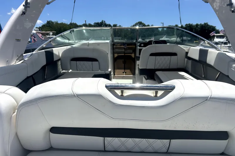 Slide: The Image of 2021 Regal 26 FasDeck boat interior with luxurious seating and modern design. - 62