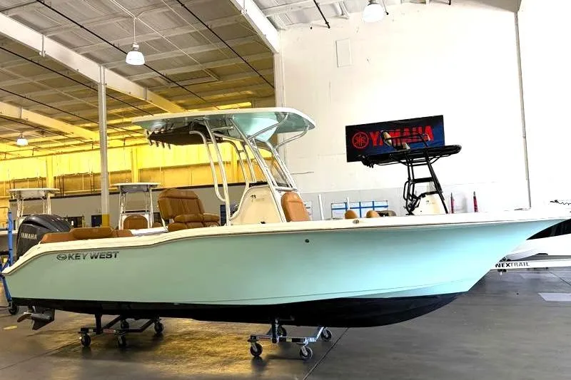 The Image of 2025 Key West 239 FS boat displayed indoors, featuring sleek design and modern amenities. - 0