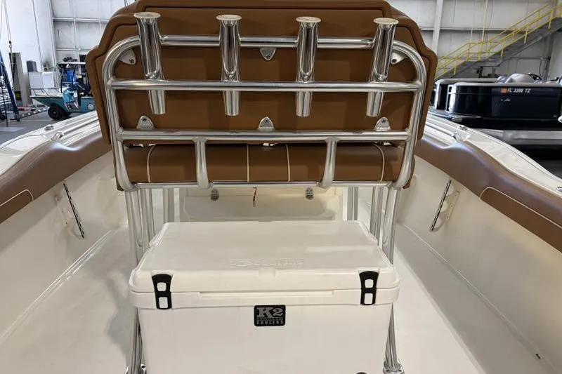 Slide: The Image of 2025 Key West 239 FS boat interior with rod holders and cooler. - 19