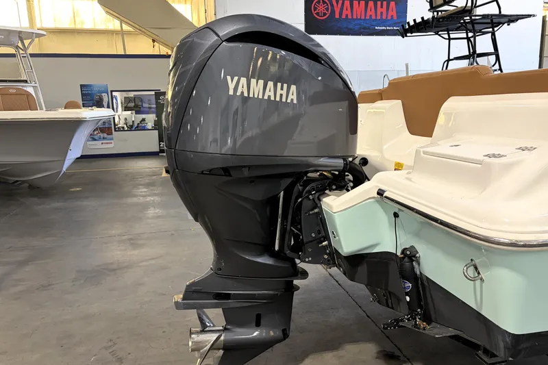 Slide: The Image of 2025 Key West 239 FS boat with Yamaha outboard motor in showroom. - 4