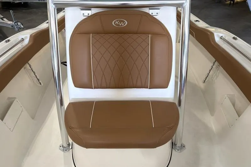 Slide: The Image of 2025 Key West 239 FS boat seat with brown leather upholstery and diamond stitching. - 8