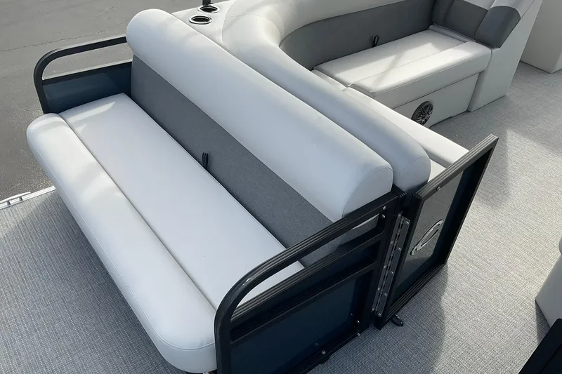 Slide: The Image of 2026 Crest Conquest SE 220 Cruise boat interior with plush seating and modern design. - 14
