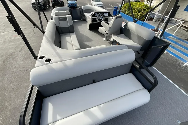 Slide: The Image of 2026 Crest Conquest SE 220 Cruise pontoon boat with spacious seating and modern design. - 15