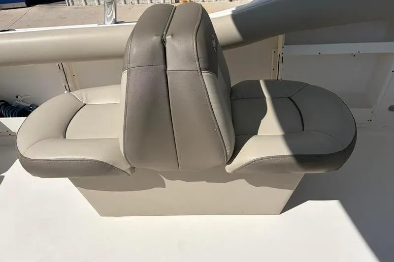 Slide: The Image of 2023 Key West 239 DFS boat seat, beige upholstery, dual seating arrangement. - 27