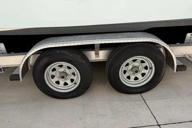 Slide: The Image of 2023 Key West 239 DFS trailer wheels on concrete surface. - 37