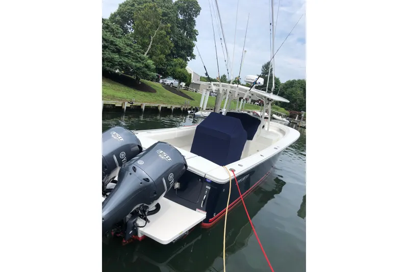 Slide: The Image of 2015 Regulator 34SS boat docked with twin Yamaha 350 engines. - 6