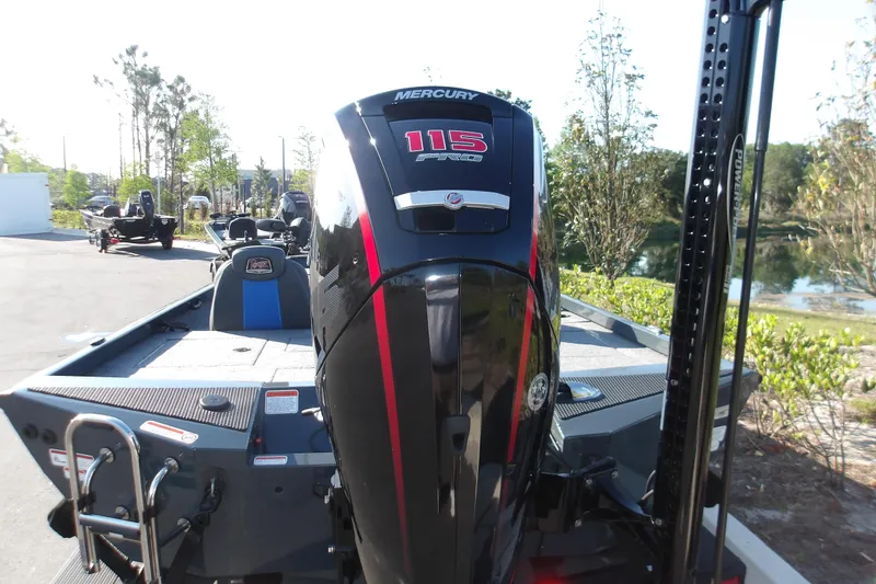 Slide: The Image of 2024 Ranger RT188P boat with Mercury 115 Pro XS engine, parked outdoors. - 10