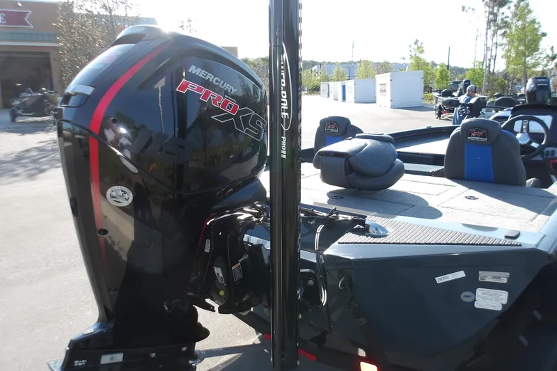 Slide: The Image of 2024 Ranger RT188P boat with Mercury Pro XS engine in a sunny outdoor setting. - 11