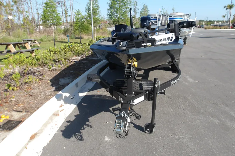 Slide: The Image of 2024 Ranger RT188P boat on trailer in outdoor setting, showcasing sleek design and modern features. - 3
