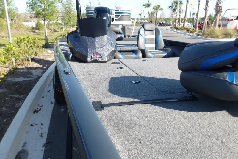 Slide: The Image of 2024 Ranger RT188P boat with spacious deck and comfortable seating in outdoor setting. - 4