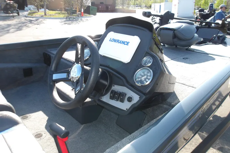 Slide: The Image of 2024 Ranger RT188P boat dashboard with steering wheel and Lowrance electronics. - 5