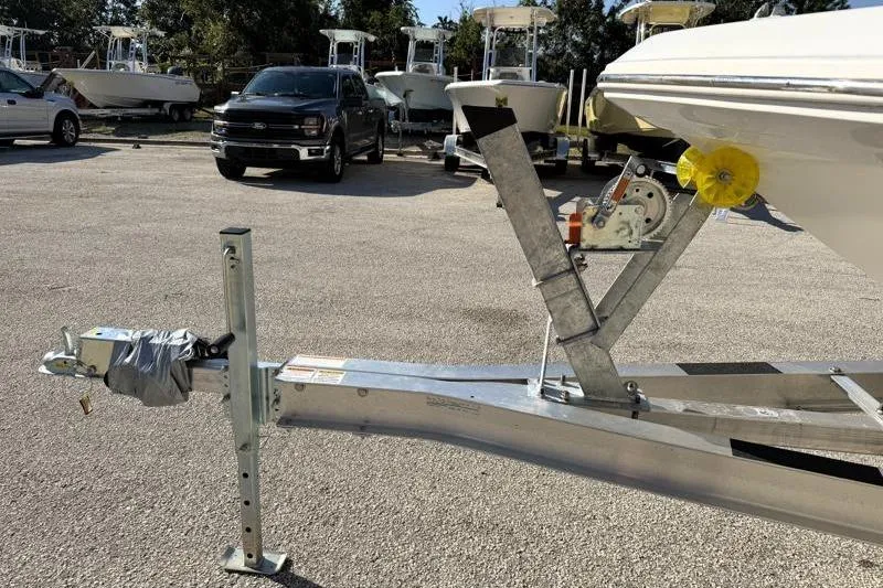 Slide: The Image of 2022 Hurricane SunDeck Sport 201 OB boat on trailer in parking lot. - 25