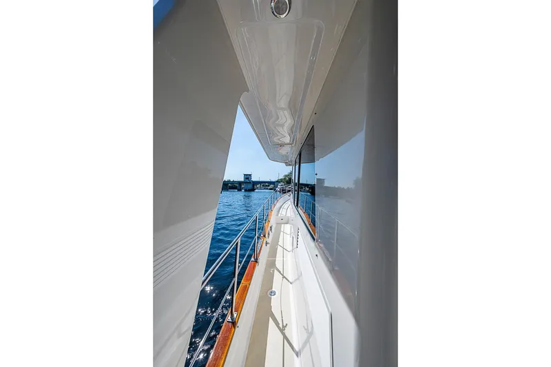 Slide: The Image of Side view of 2013 Grand Banks 43 Europa yacht on water. - 11