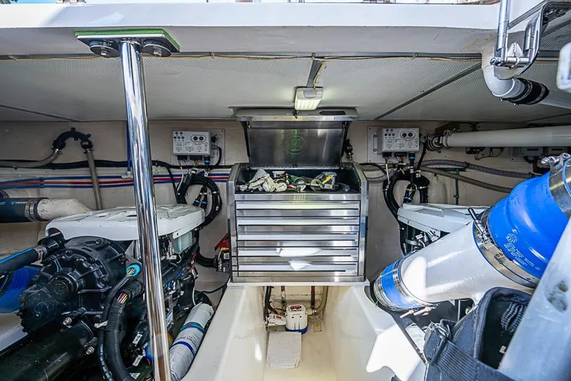 Slide: The Image of Engine room of 2013 Grand Banks 43 Europa with organized tools and equipment. - 60