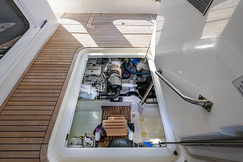 Slide: The Image of Engine compartment of 2013 Grand Banks 43 Europa yacht with wooden deck. - 62