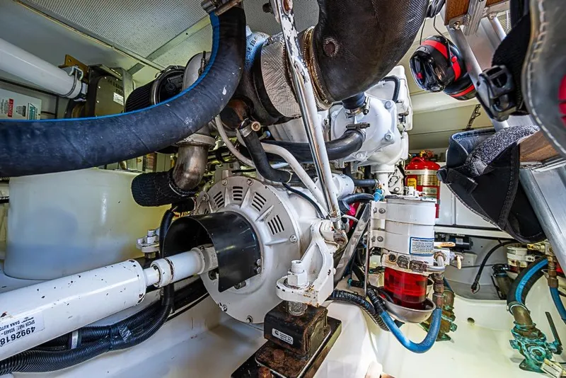 Slide: The Image of Engine room of 2013 Grand Banks 43 Europa yacht, showcasing mechanical components and systems. - 65