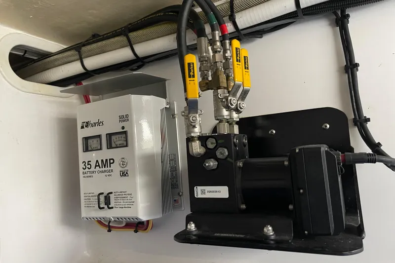 Slide: The Image of Battery charger and hydraulic system in a 2016 Bahama 41 boat. - 20