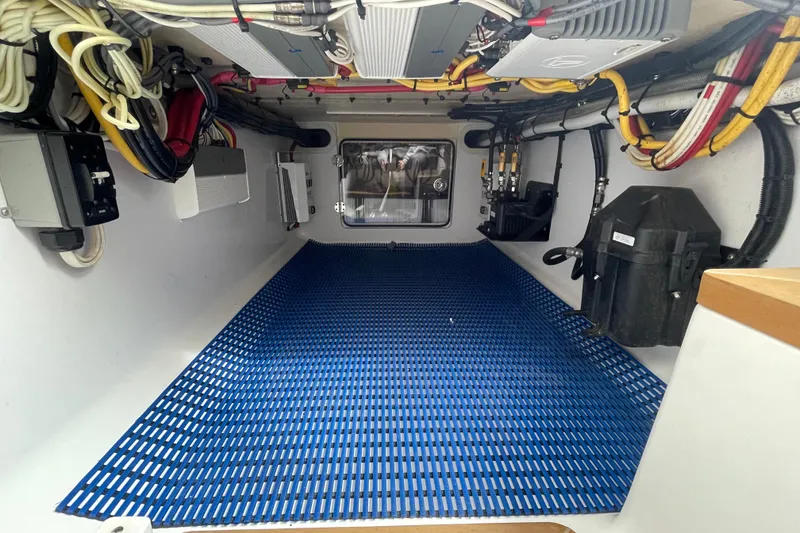 Slide: The Image of Interior of a 2016 Bahama 41 boat, showcasing wiring and equipment. - 9