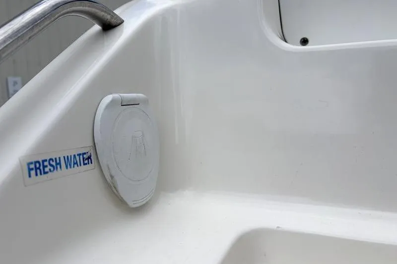 Slide: The Image of 2024 Key West 239 DFS boat fresh water access point. - 15