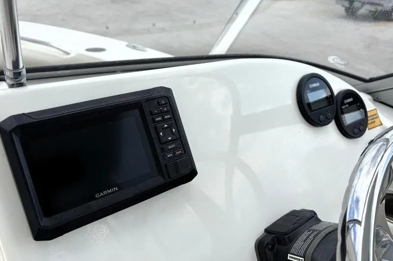 Slide: The Image of Dashboard of 2024 Key West 239 DFS boat with Garmin navigation system. - 24