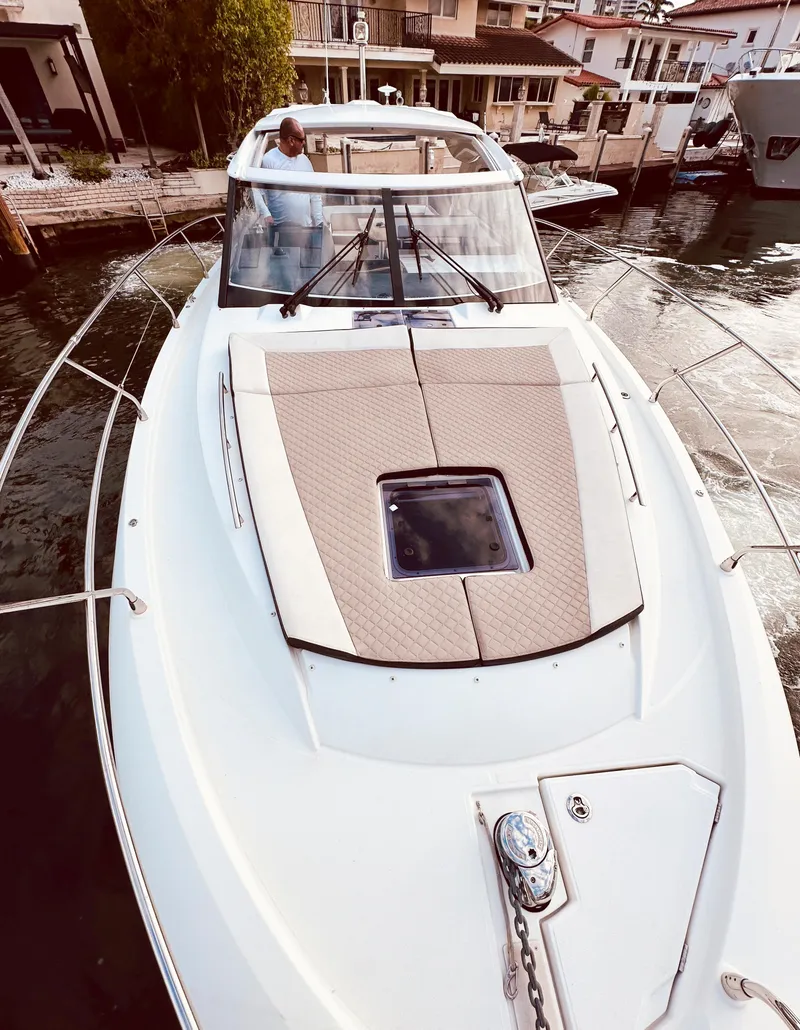 Slide: The Image of 2017 Jeanneau Leader 40 yacht docked, featuring sleek design and spacious deck. - 23